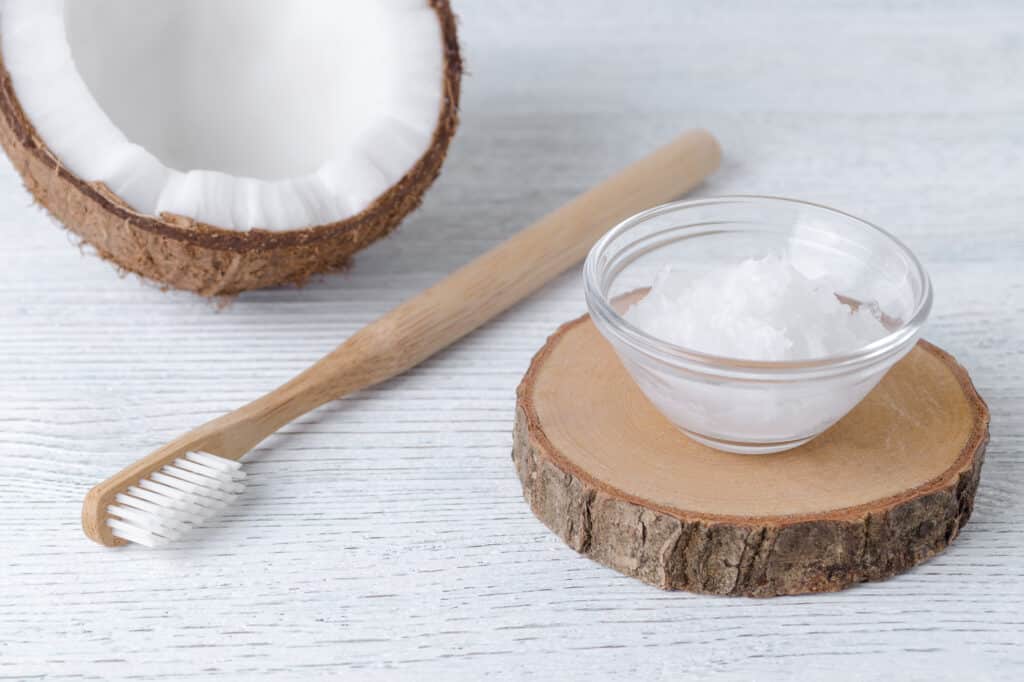 coconut oil toothpaste for a healthy teeth and wooden toothbrush