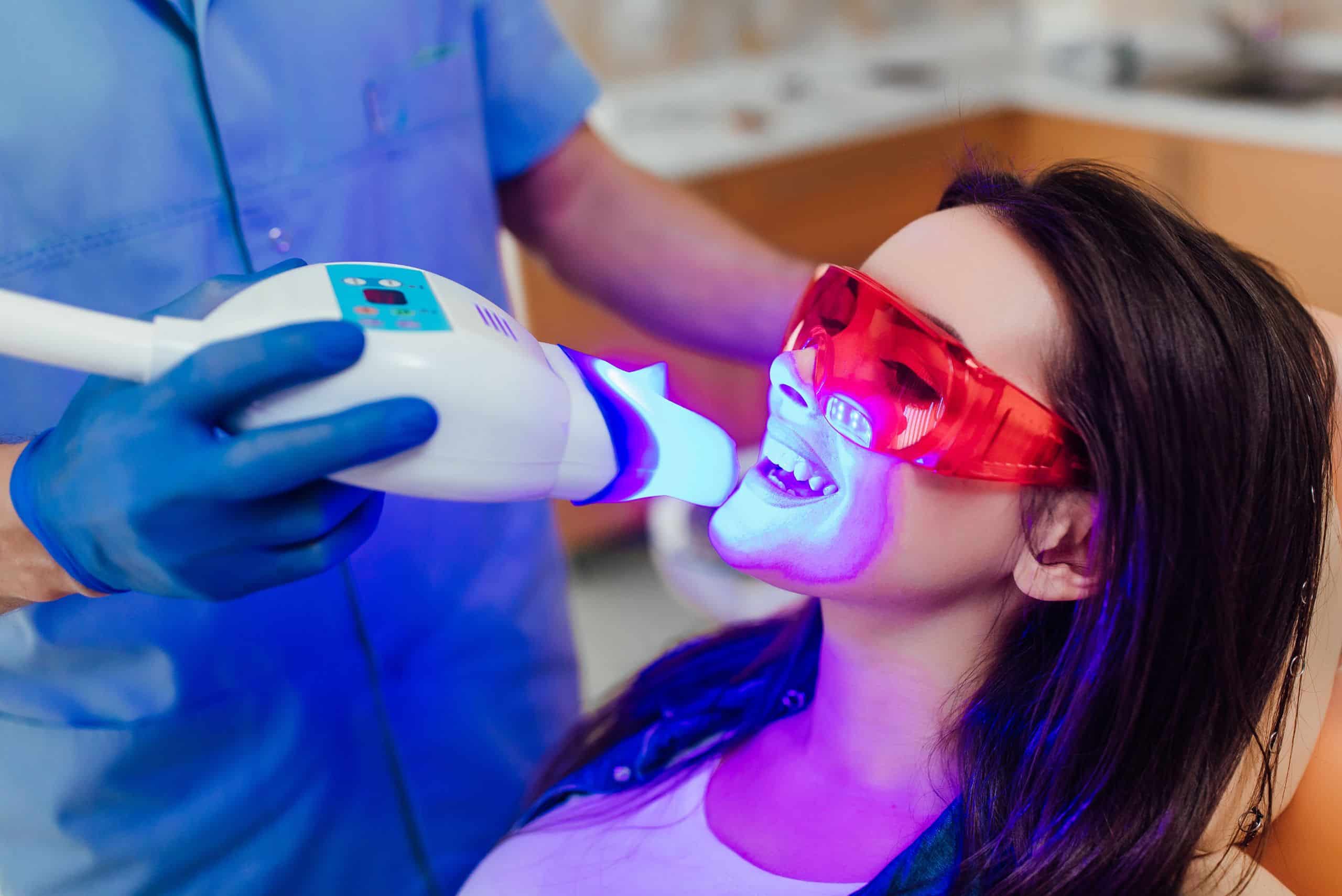 teeth whitening woman bleaching dentist clinic