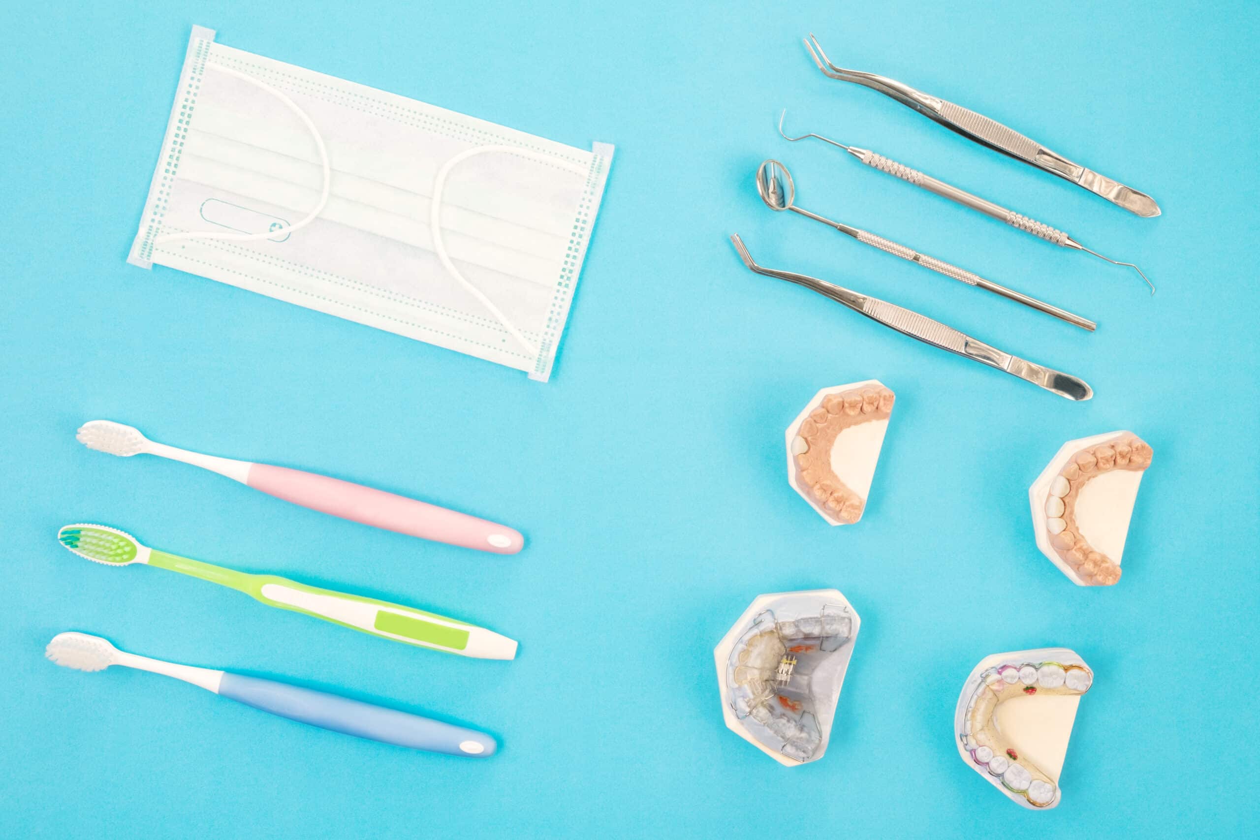 Dental tools use for dentist on the blue background
